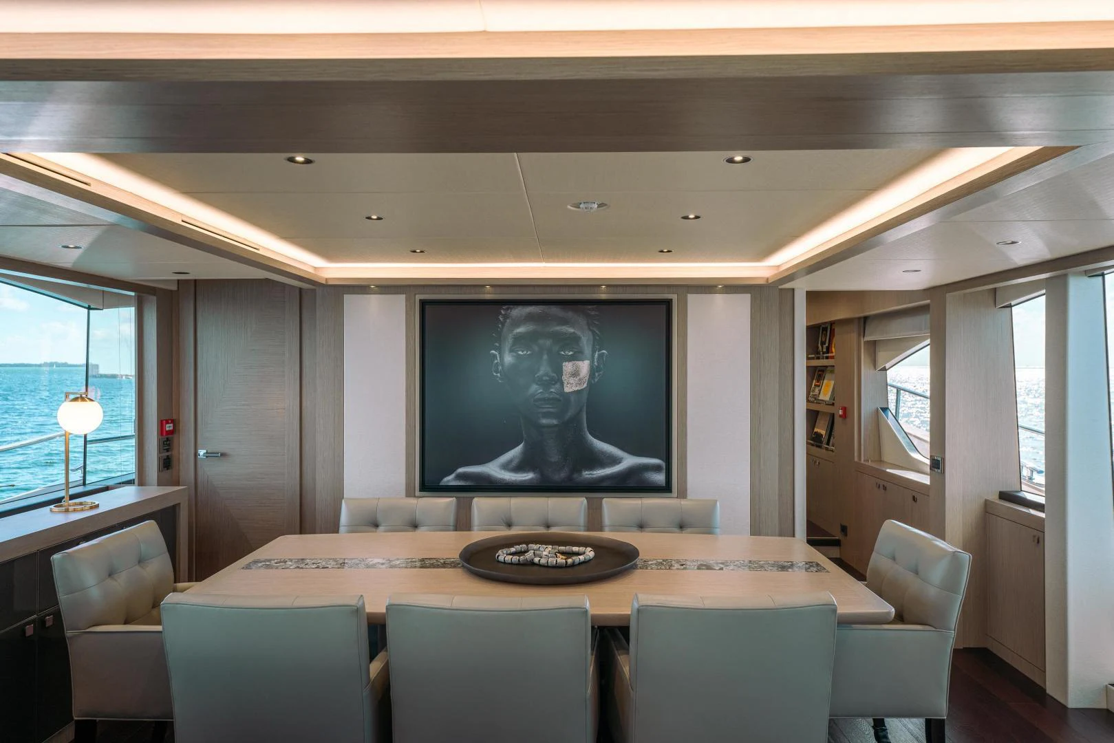 a large room with a large screen aboard EOS Yacht for Sale