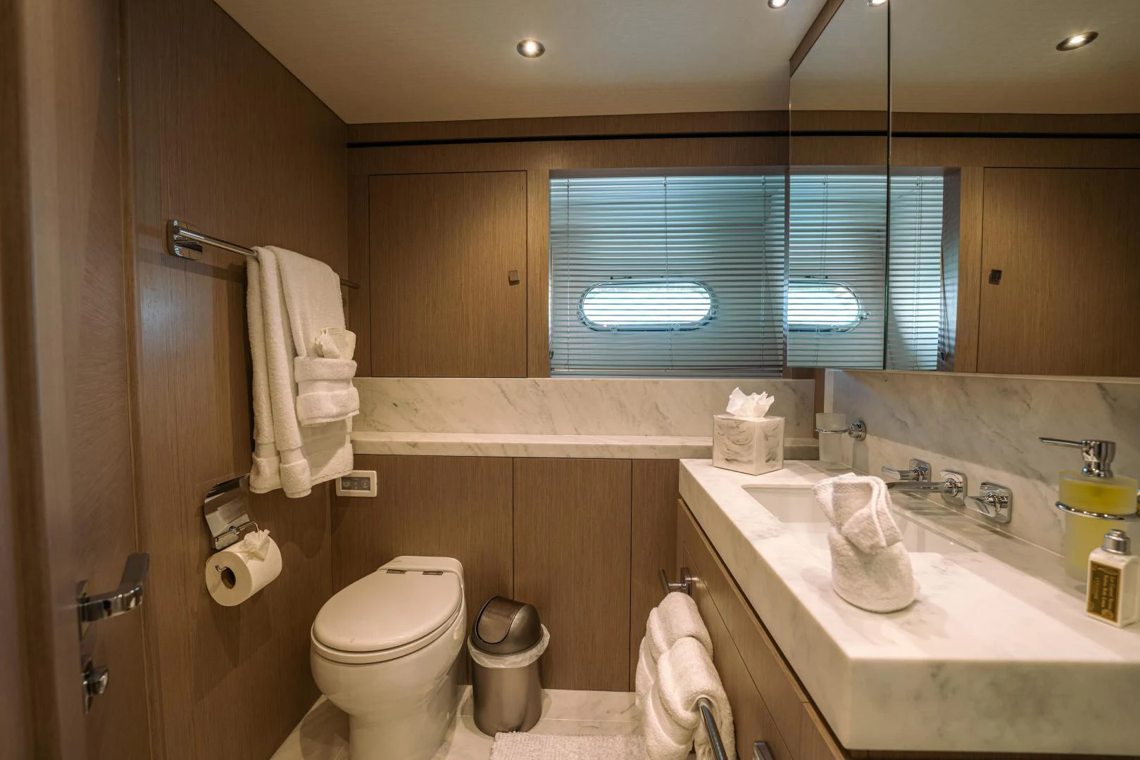 a bathroom with a toilet and a sink aboard EOS Yacht for Sale