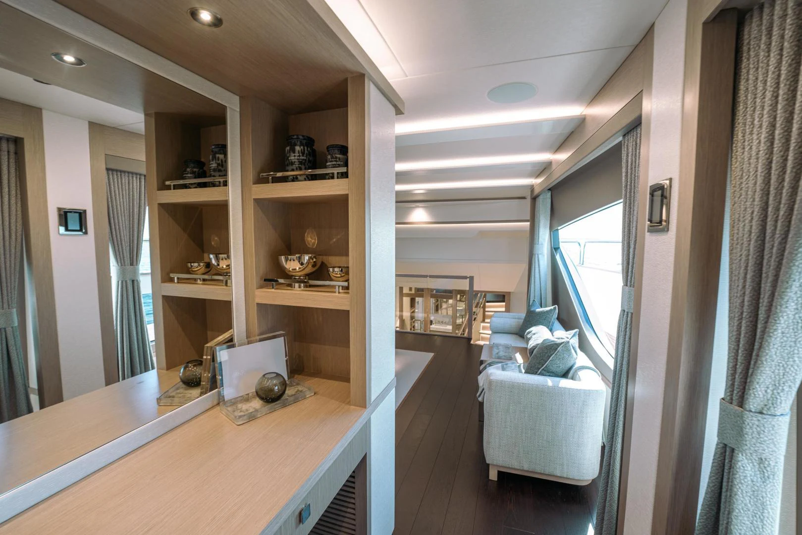 a room with a bed and a desk aboard EOS Yacht for Sale
