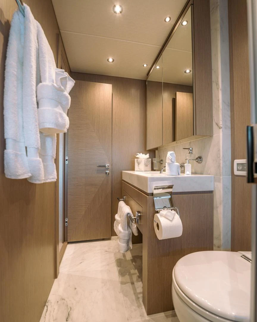 a bathroom with a sink and toilet aboard EOS Yacht for Sale