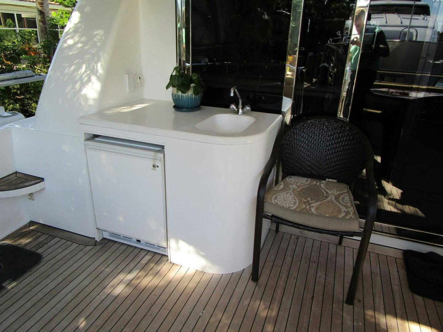 a chair next to a sink aboard MAGNIFICENT DOLLS Yacht for Sale