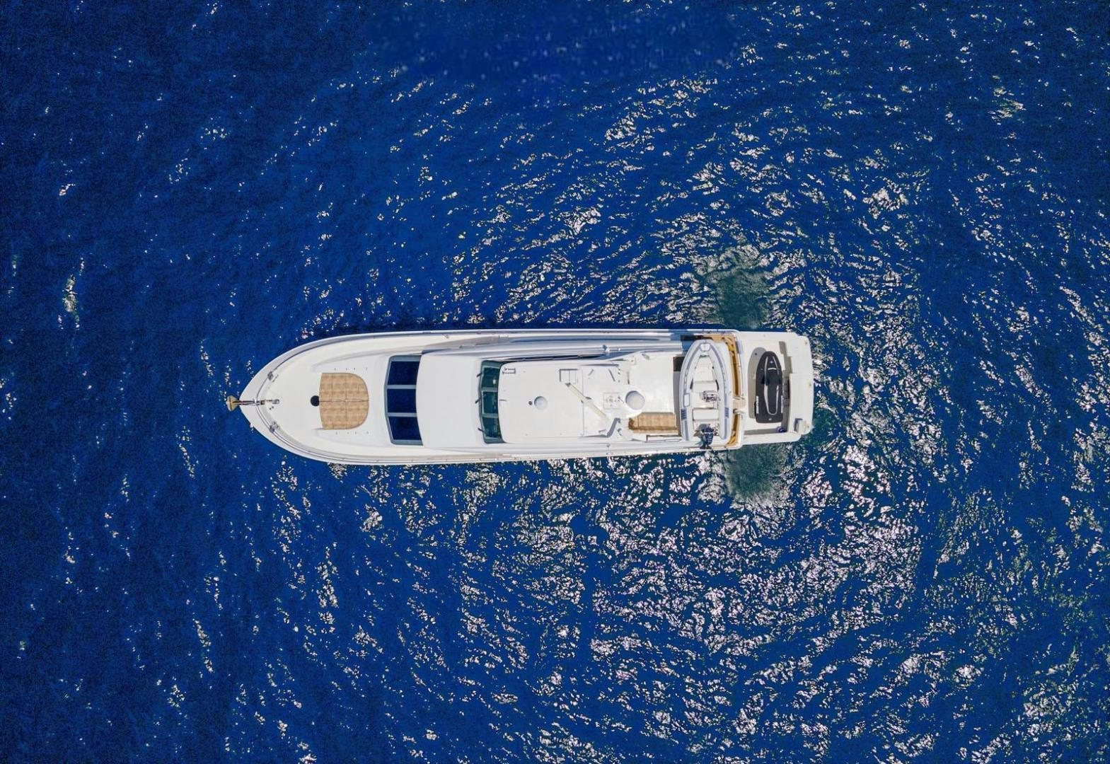 a small boat in the water aboard MAGNIFICENT DOLLS Yacht for Sale