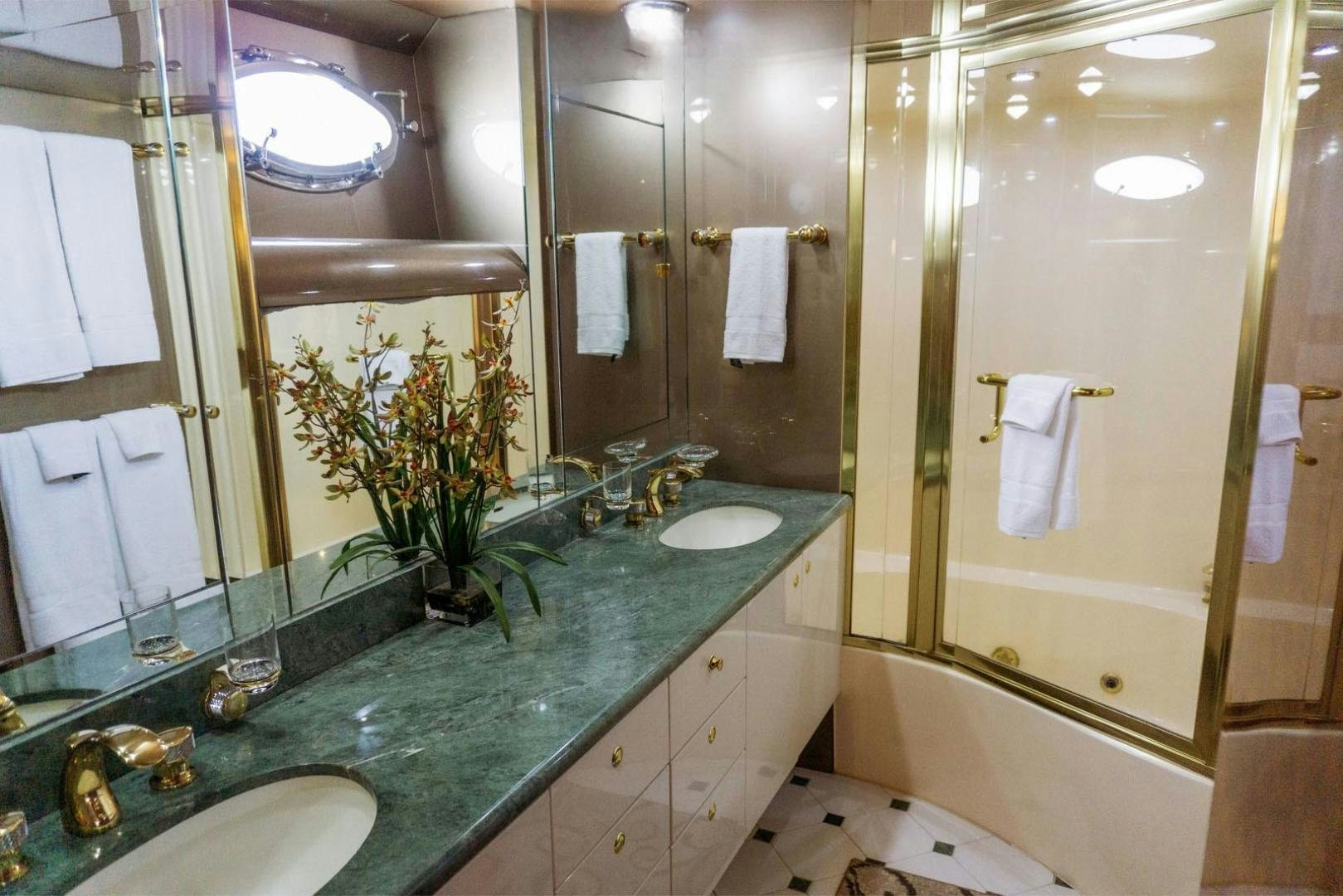 a bathroom with a large shower aboard MAGNIFICENT DOLLS Yacht for Sale