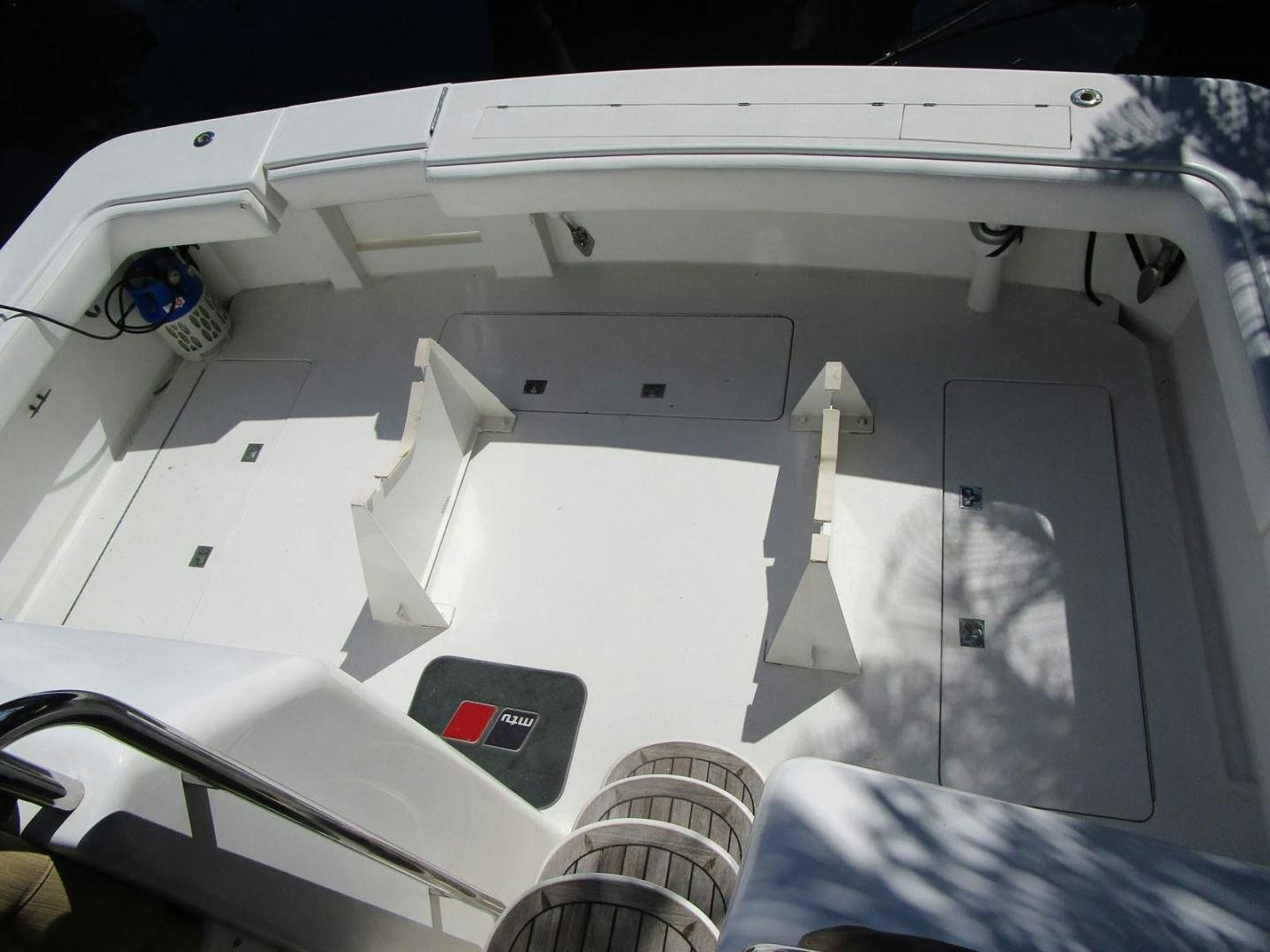 a close-up of a white airplane aboard MAGNIFICENT DOLLS Yacht for Sale