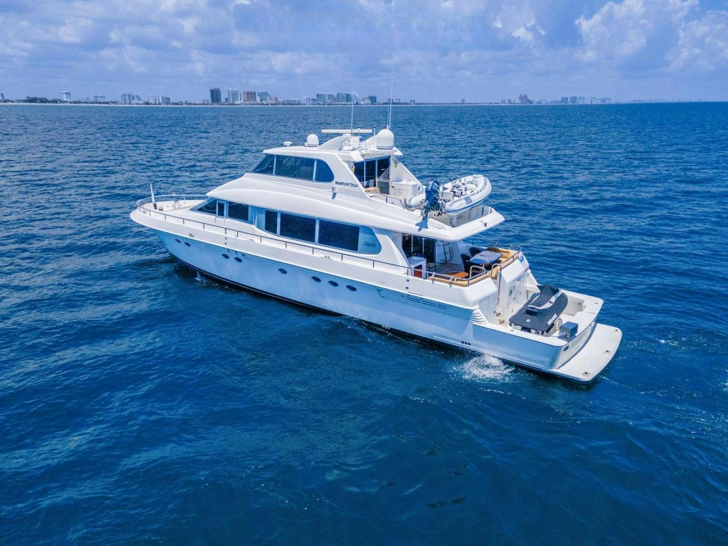 a boat in the water aboard MAGNIFICENT DOLLS Yacht for Sale