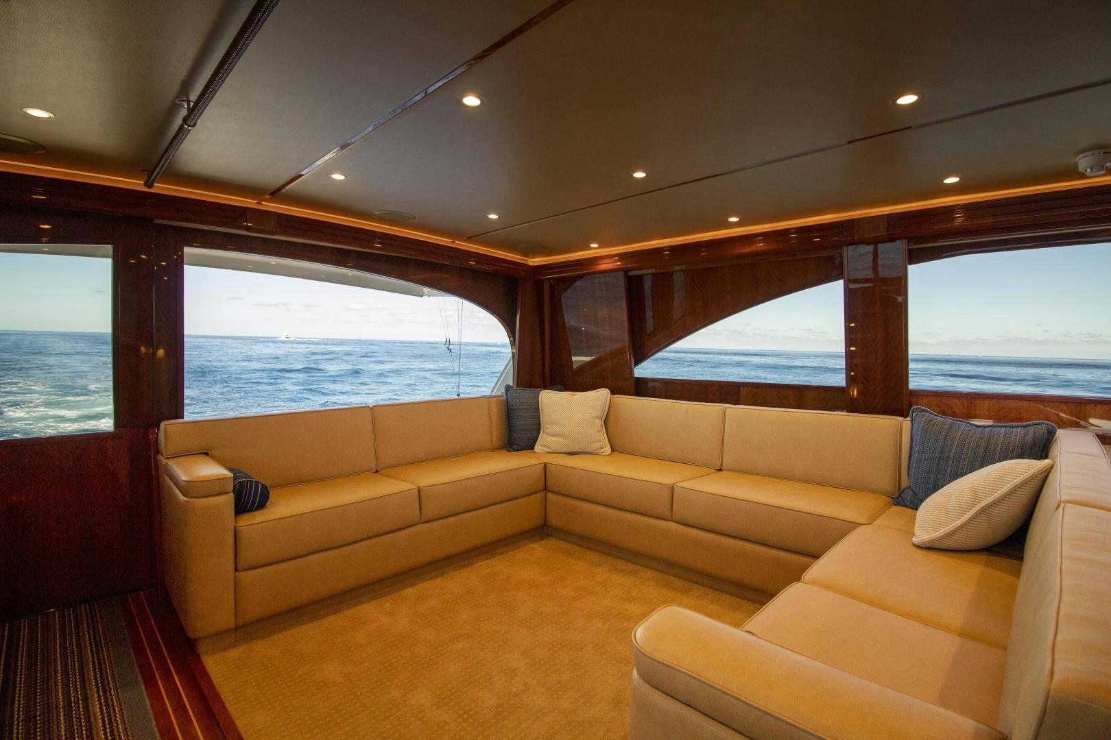 a living room with a large window aboard VICTORY Yacht for Sale