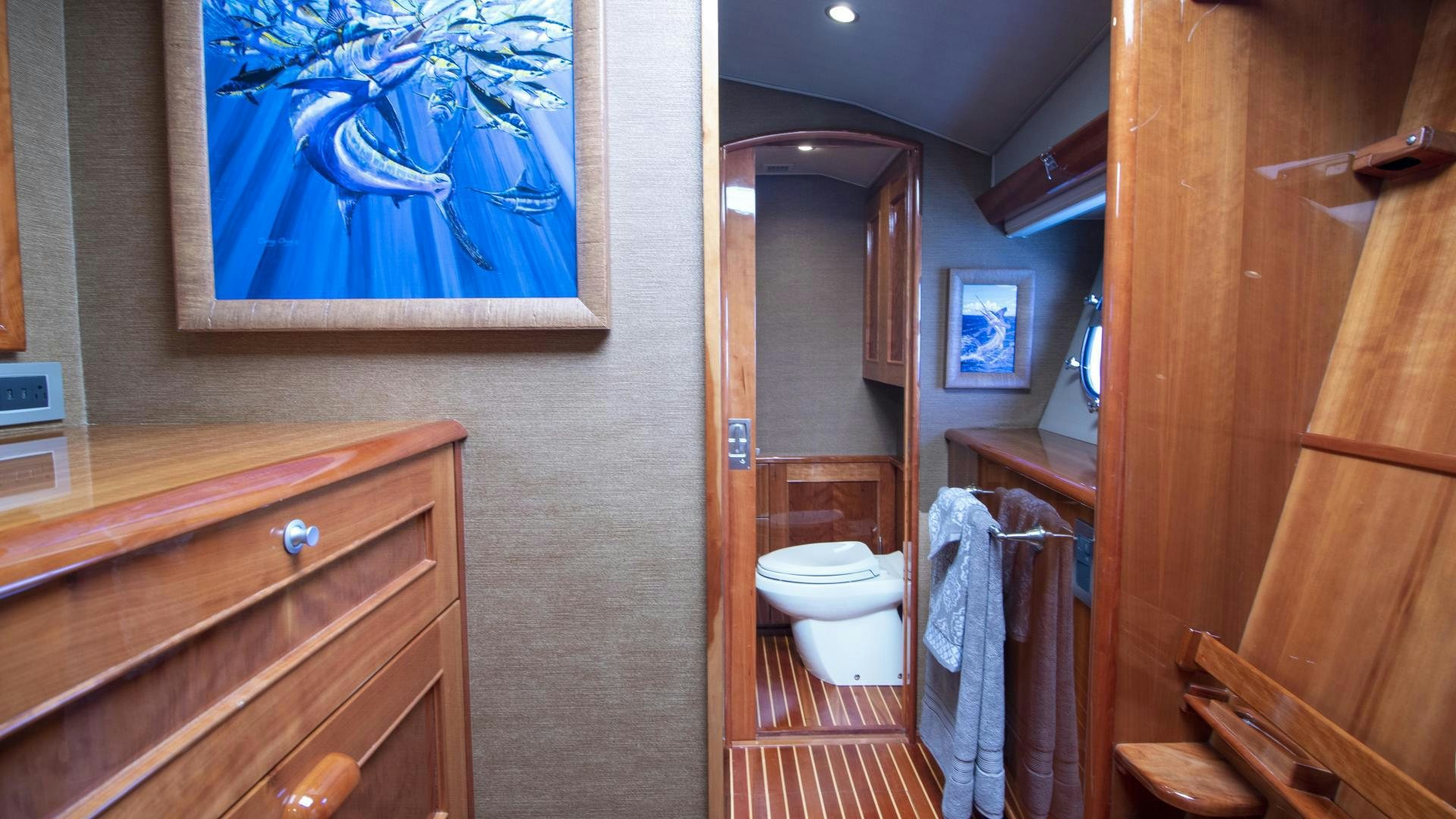 a bathroom with a toilet and a sink aboard VICTORY Yacht for Sale