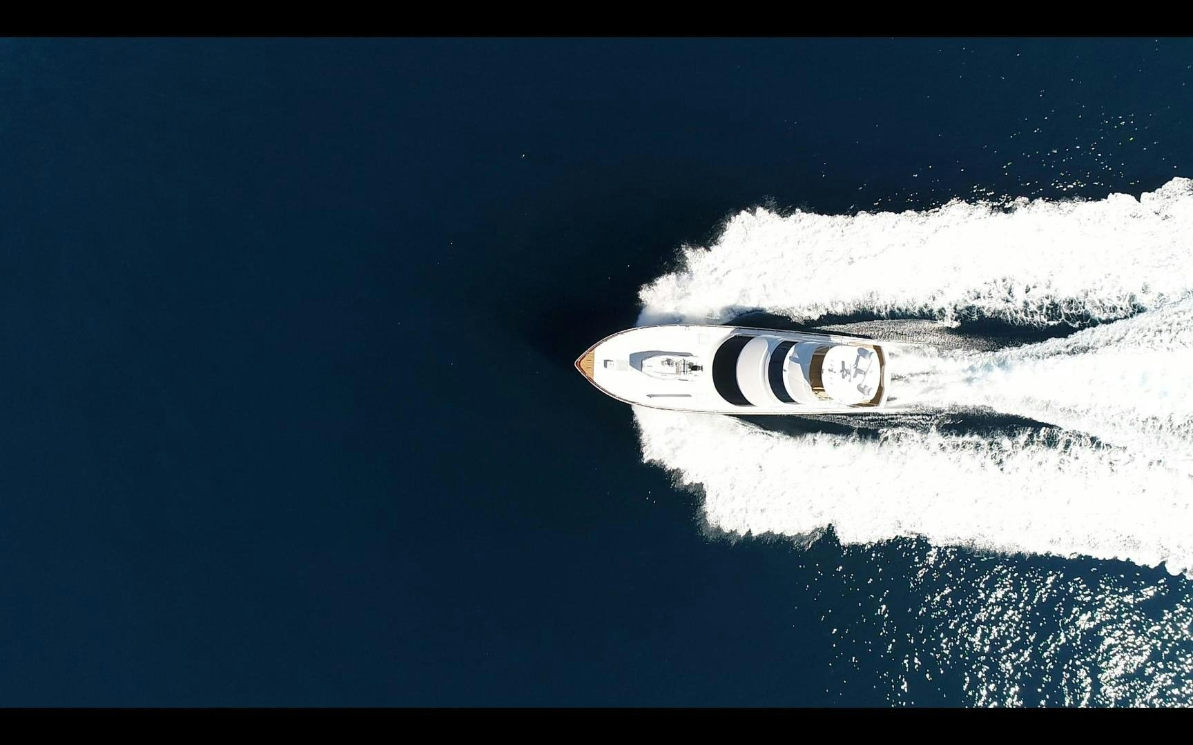 a white boat in the water aboard VICTORY Yacht for Sale