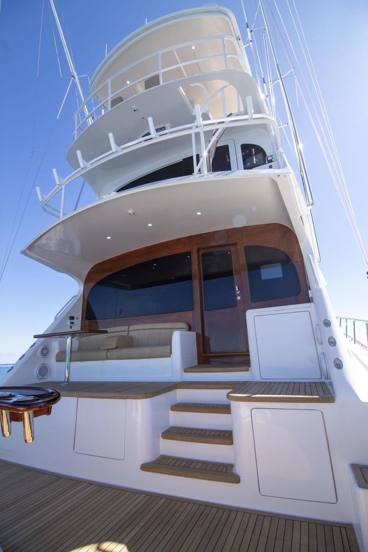 a white boat on a deck aboard VICTORY Yacht for Sale