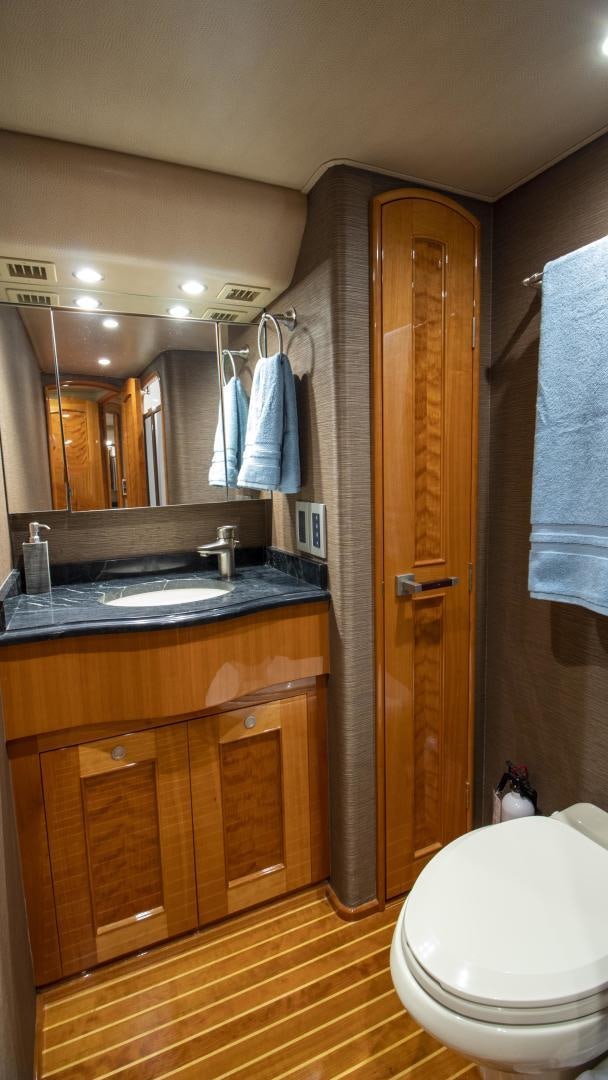 a bathroom with a sink and a toilet aboard VICTORY Yacht for Sale