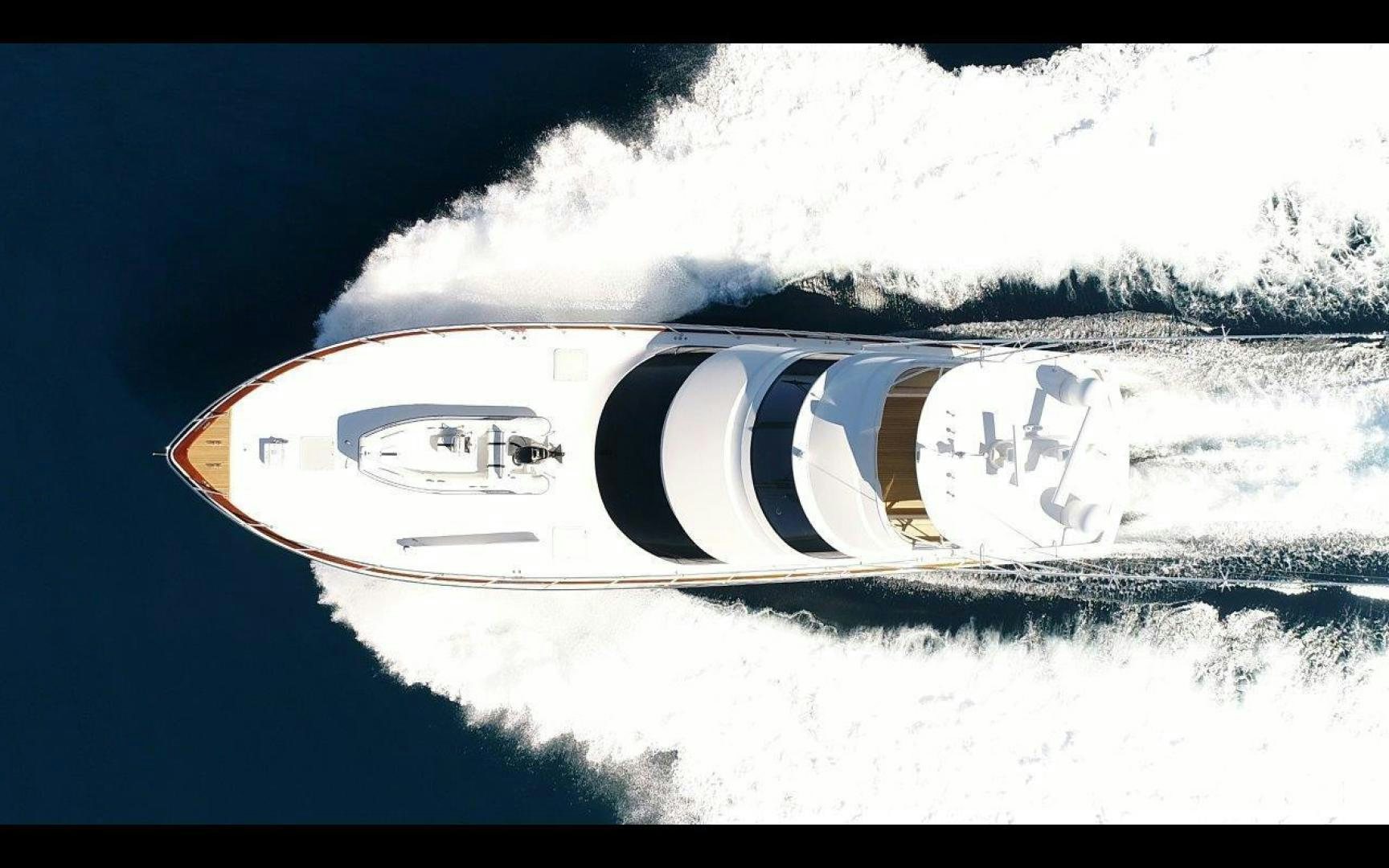 a car driving on a snowy road aboard VICTORY Yacht for Sale