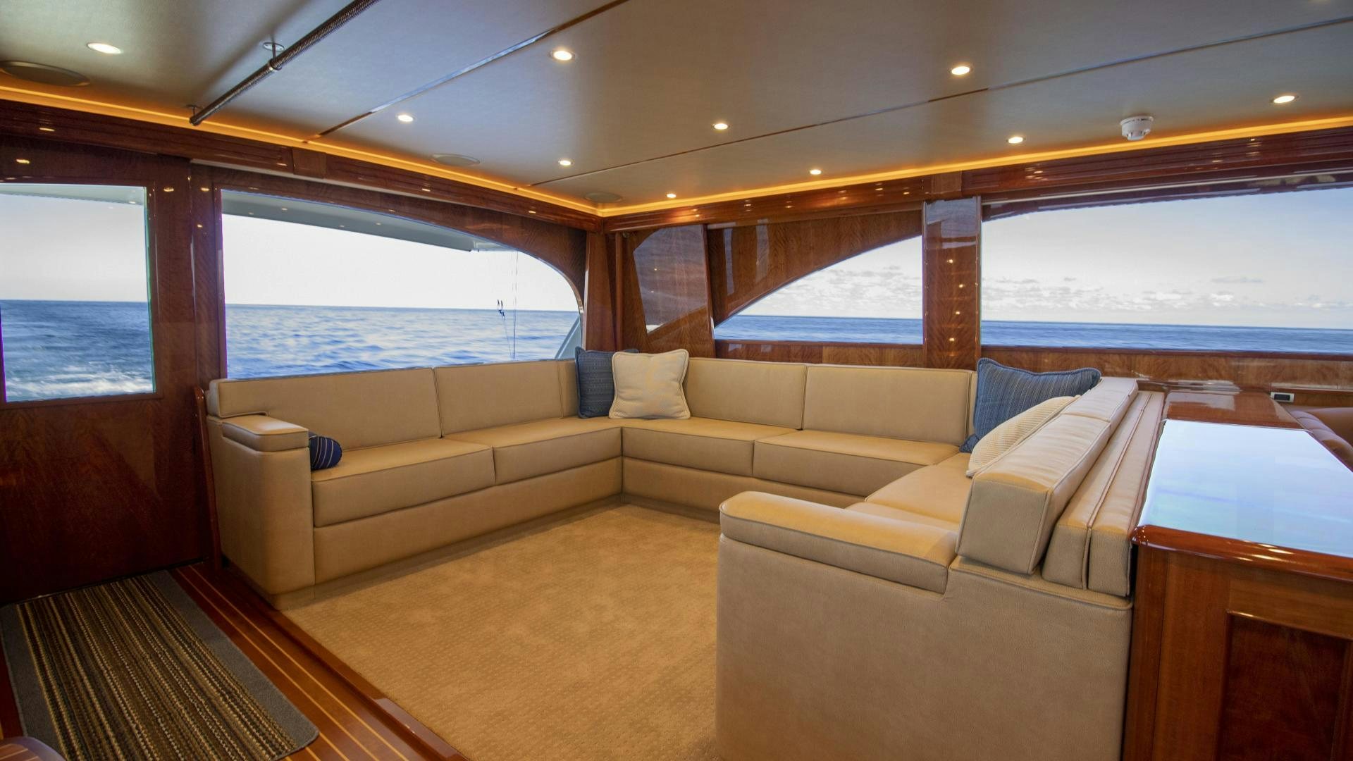 a living room with a large window aboard VICTORY Yacht for Sale