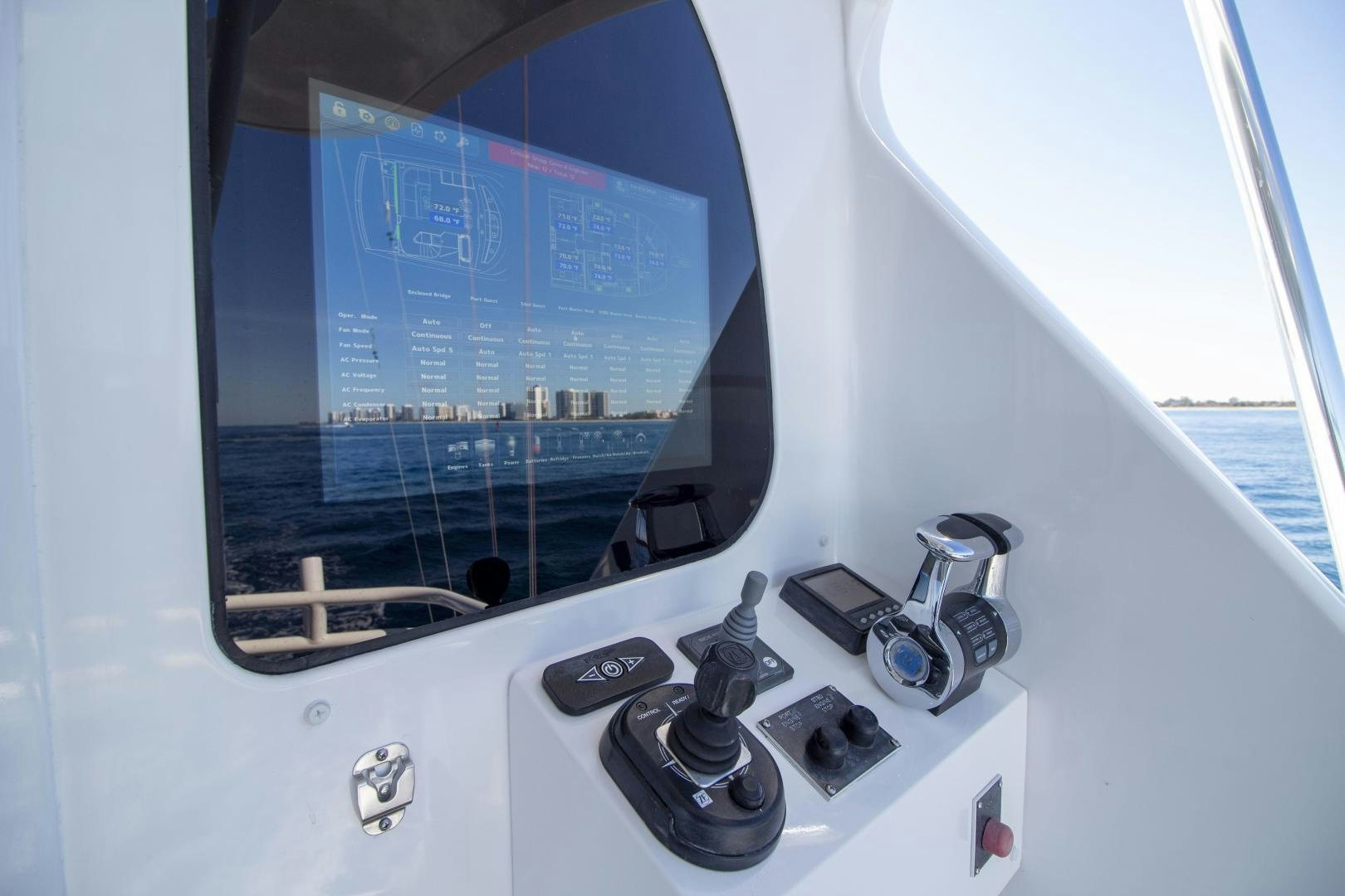 a control panel with a screen aboard VICTORY Yacht for Sale