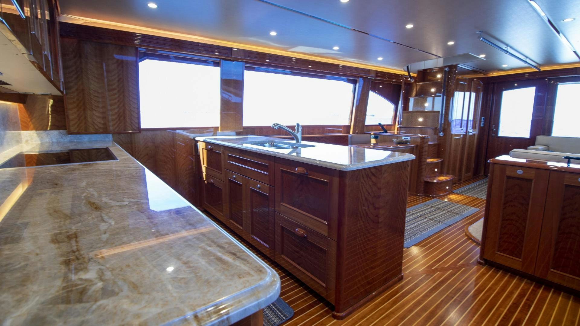 a kitchen with a large island aboard VICTORY Yacht for Sale