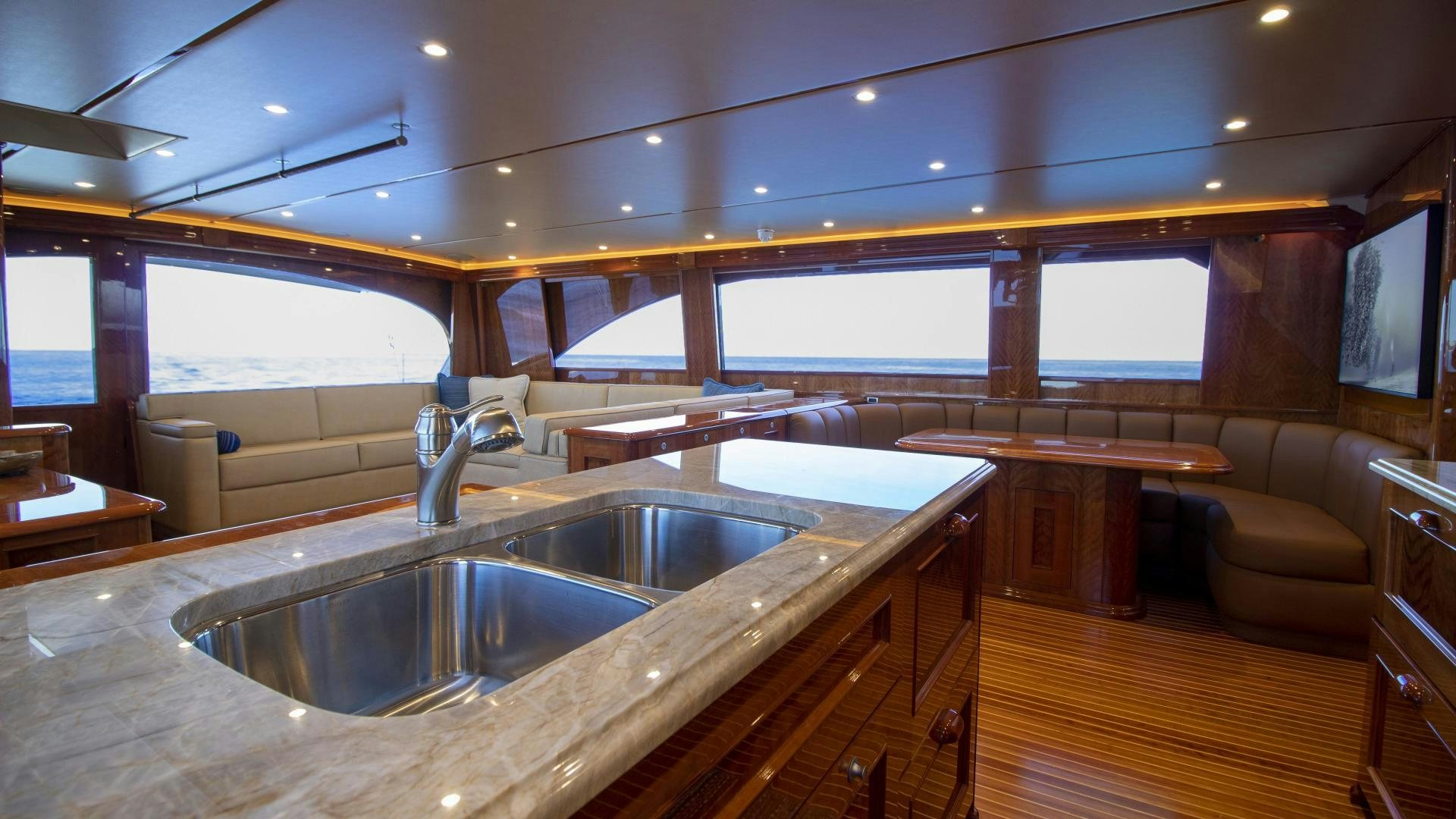 a kitchen with a sink and cabinets aboard VICTORY Yacht for Sale