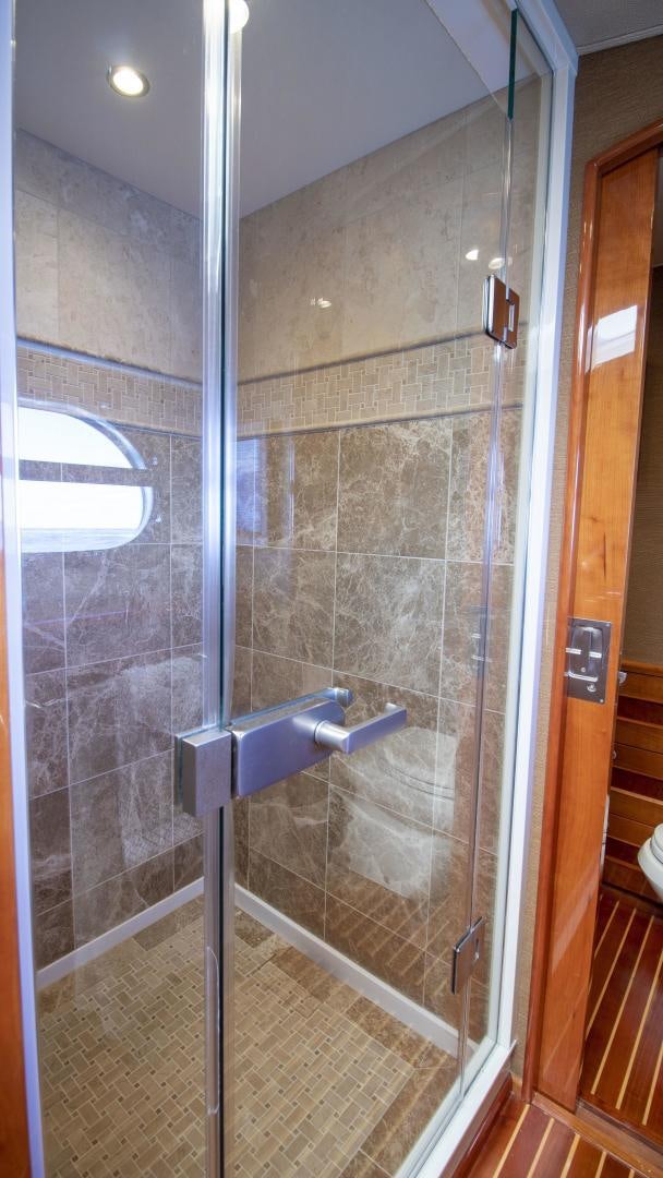a shower unit with glass doors aboard VICTORY Yacht for Sale