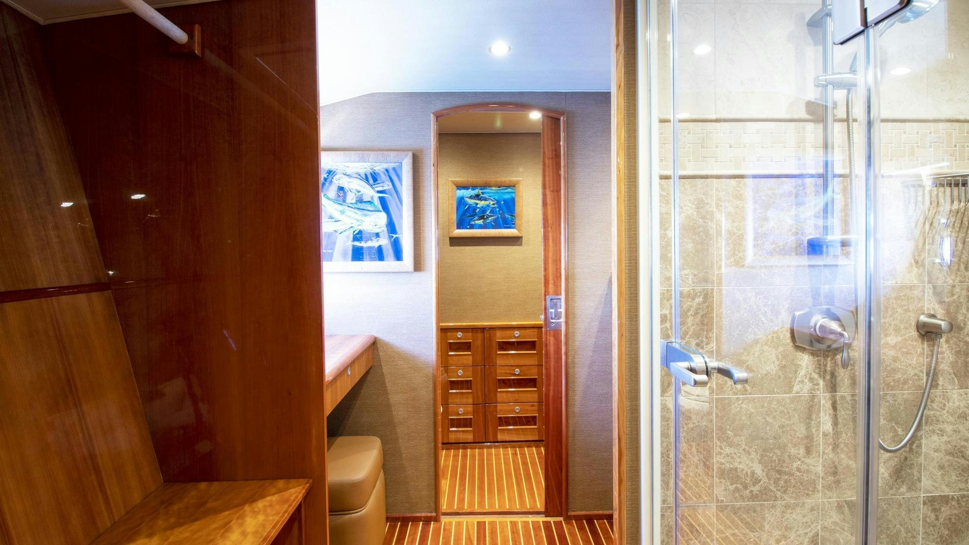 a bathroom with a shower unit and a sink aboard VICTORY Yacht for Sale