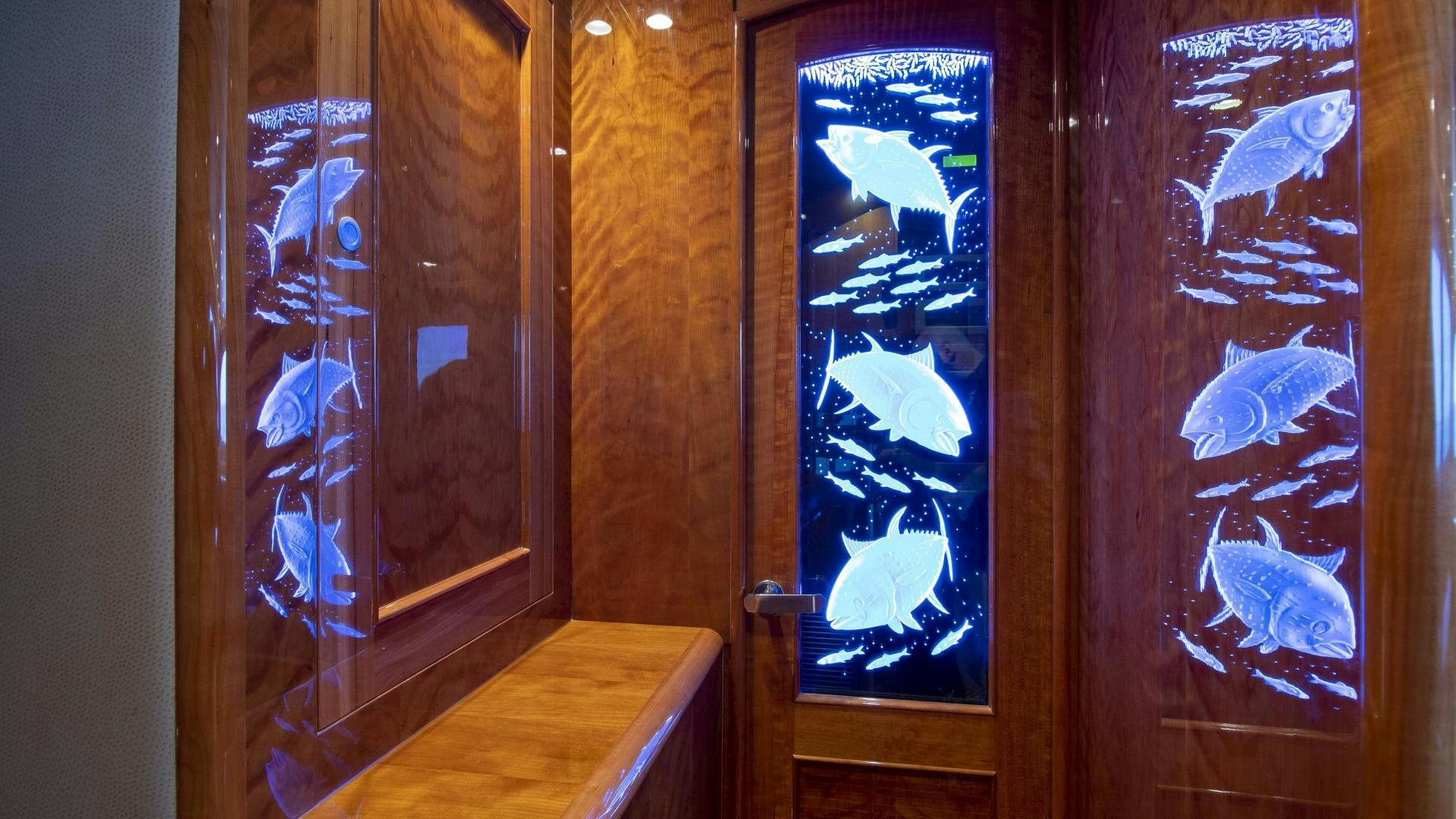 a group of windows with a glass door aboard VICTORY Yacht for Sale