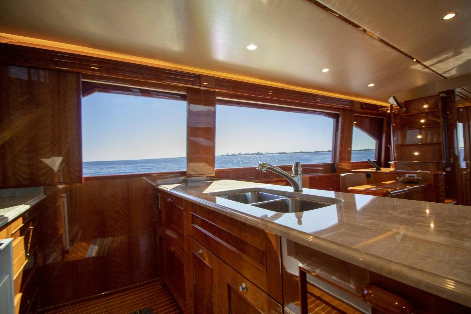 a kitchen with a large island aboard VICTORY Yacht for Sale