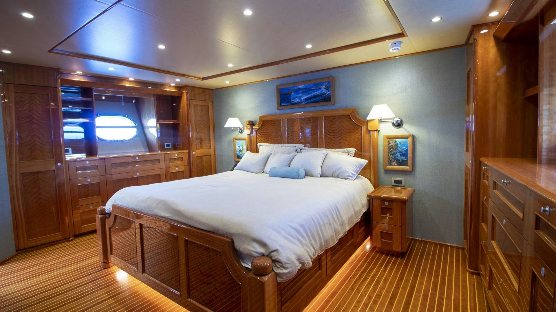 a large bedroom with a large bed aboard VICTORY Yacht for Sale