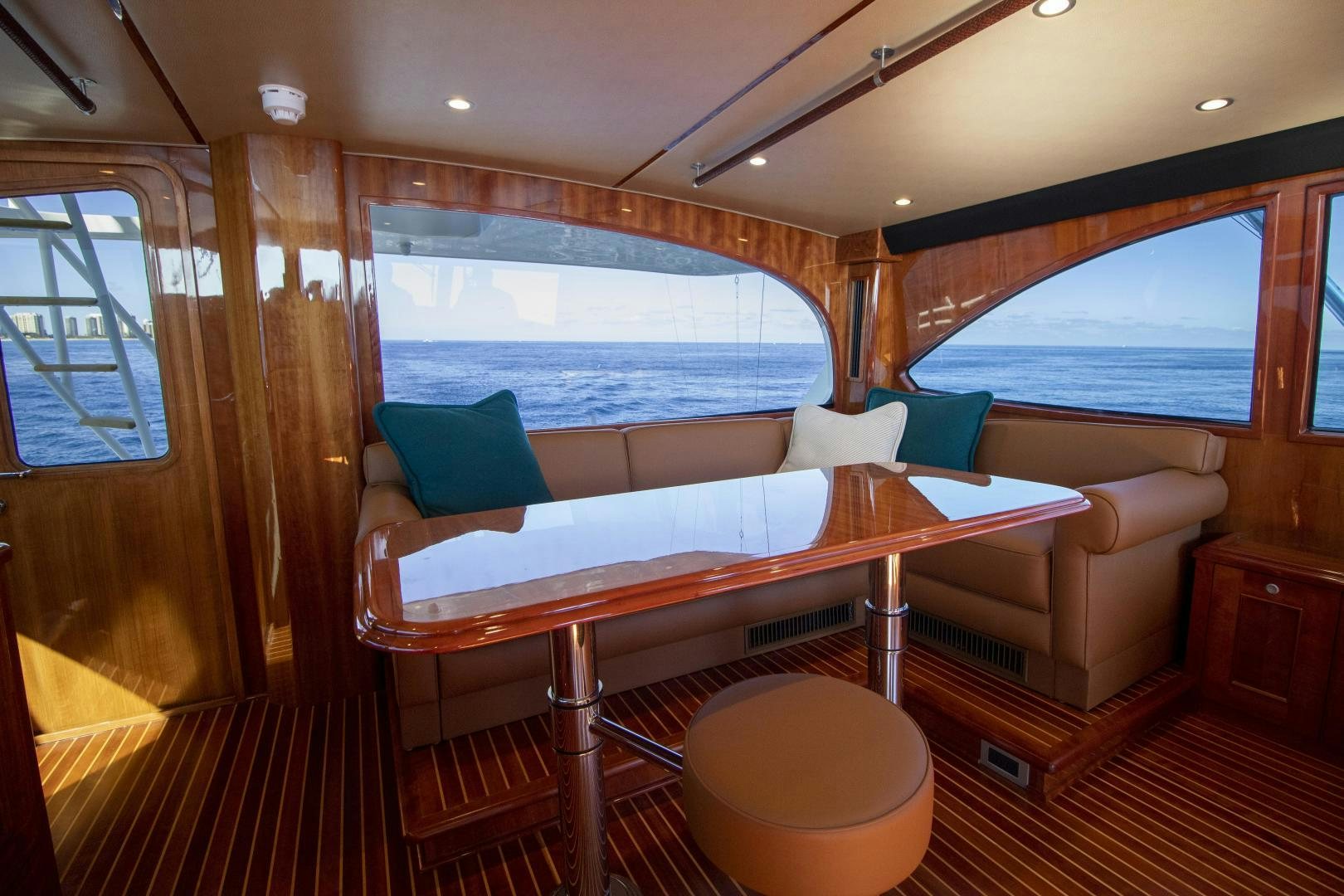 a room with a bed and a table aboard VICTORY Yacht for Sale