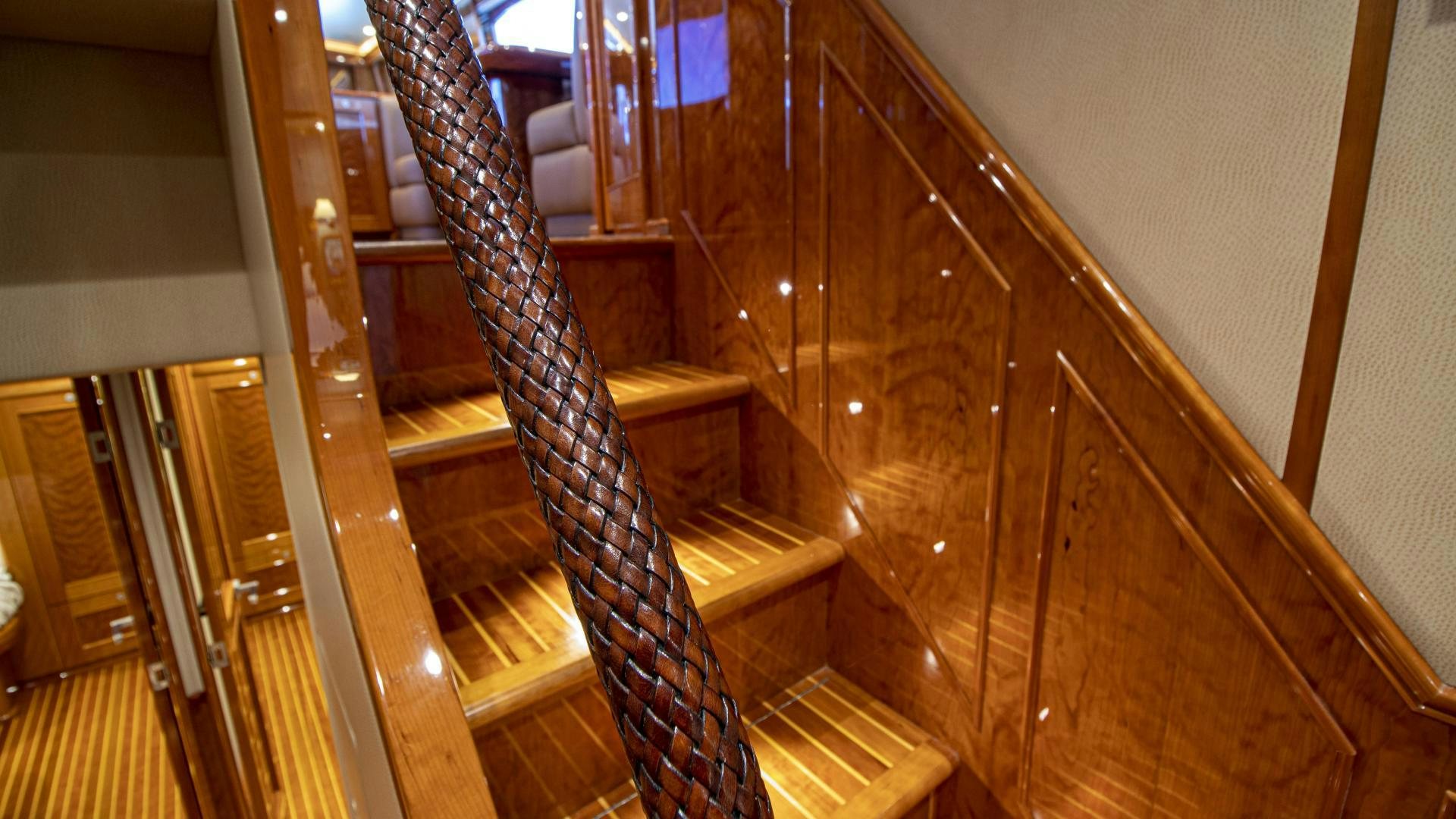a staircase with metal railings aboard VICTORY Yacht for Sale