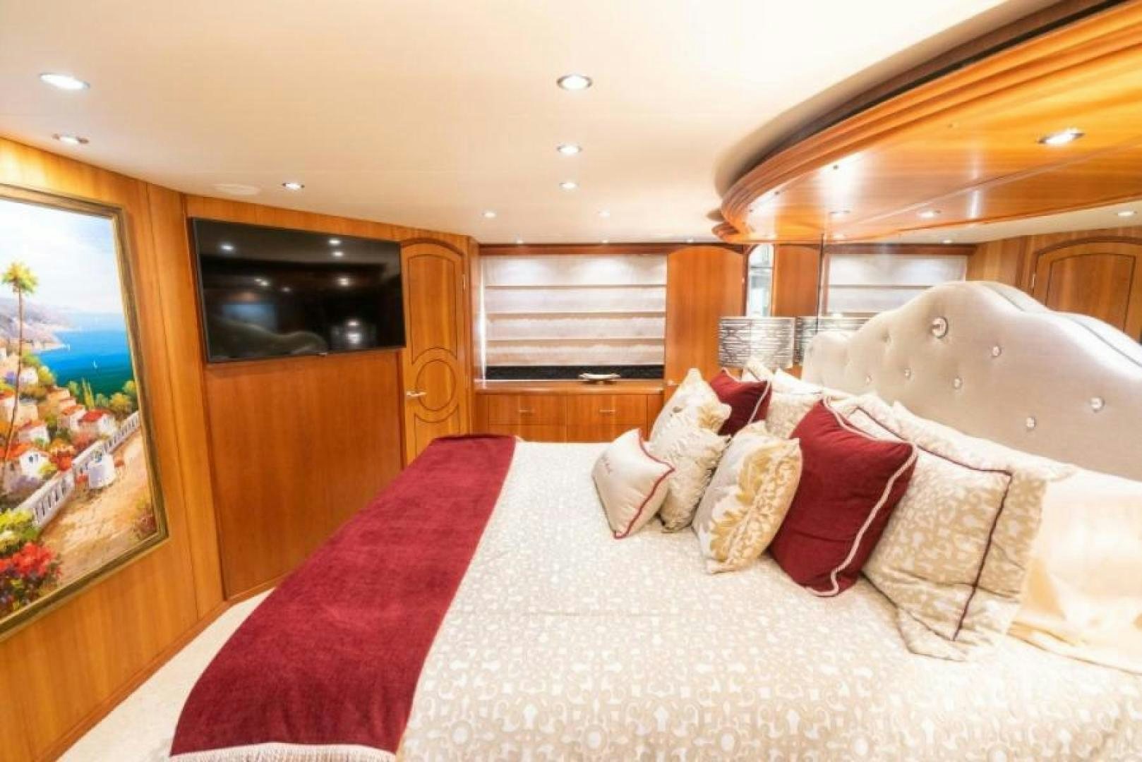 a bed with pillows and pillows aboard DANIELLE Yacht for Sale