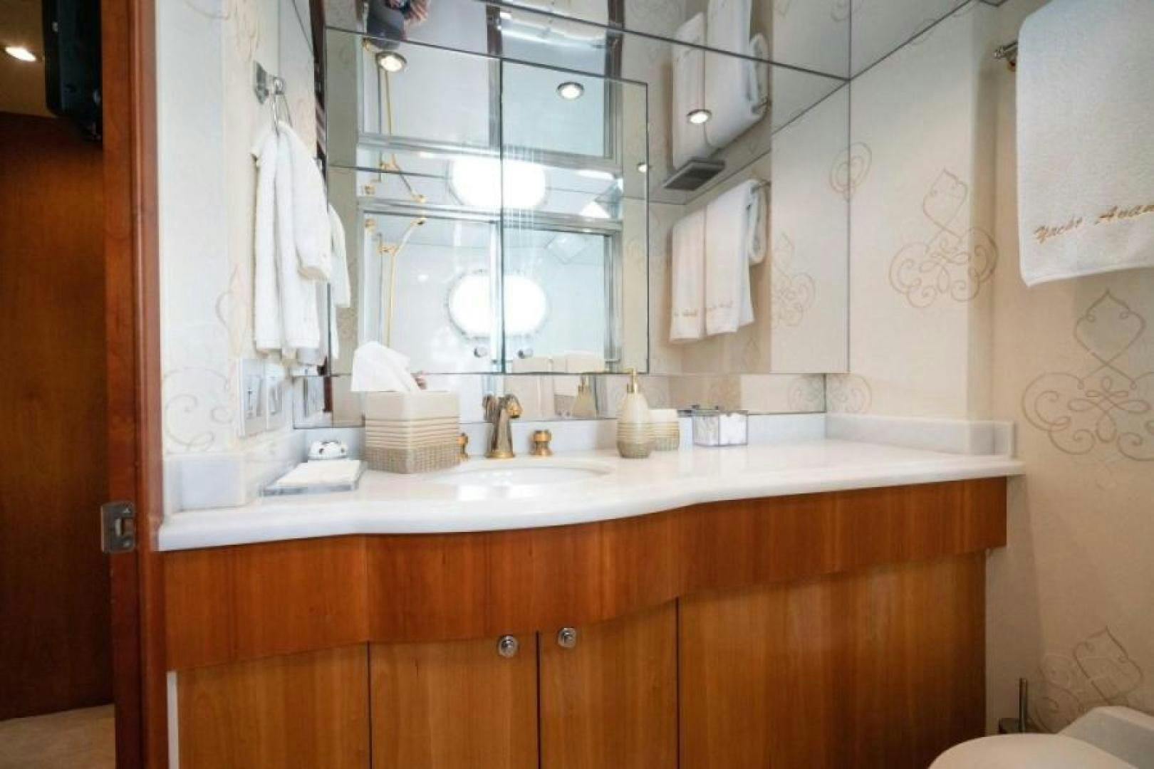 a bathroom with a large mirror aboard DANIELLE Yacht for Sale
