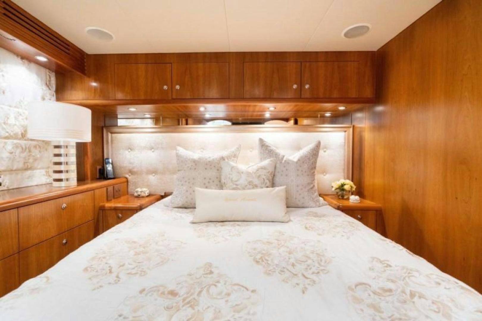 a bed with white sheets aboard DANIELLE Yacht for Sale