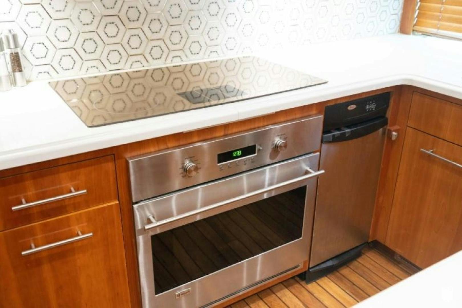 a kitchen with a stove and oven aboard DANIELLE Yacht for Sale