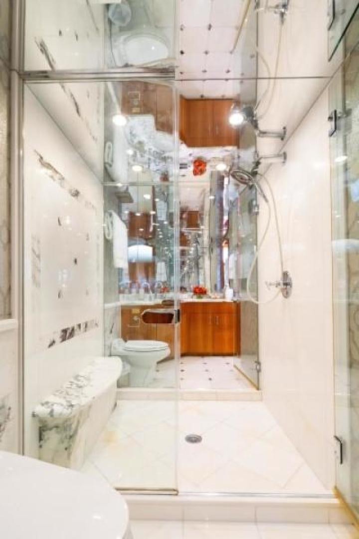 a bathroom with a toilet and sink aboard DANIELLE Yacht for Sale