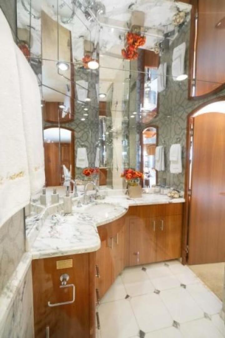 a bathroom with a large mirror aboard DANIELLE Yacht for Sale