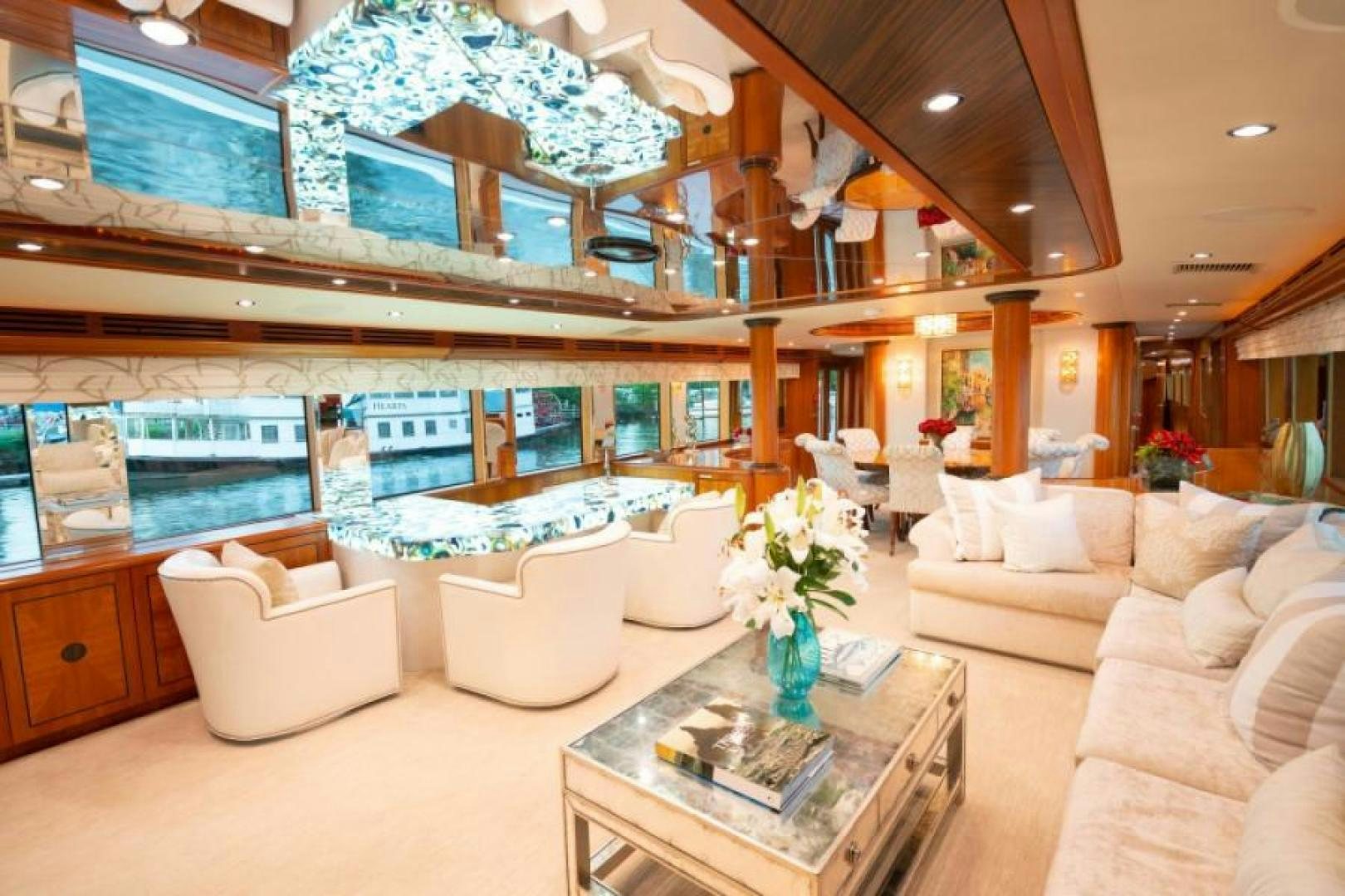 a room with a large window and a couch aboard DANIELLE Yacht for Sale