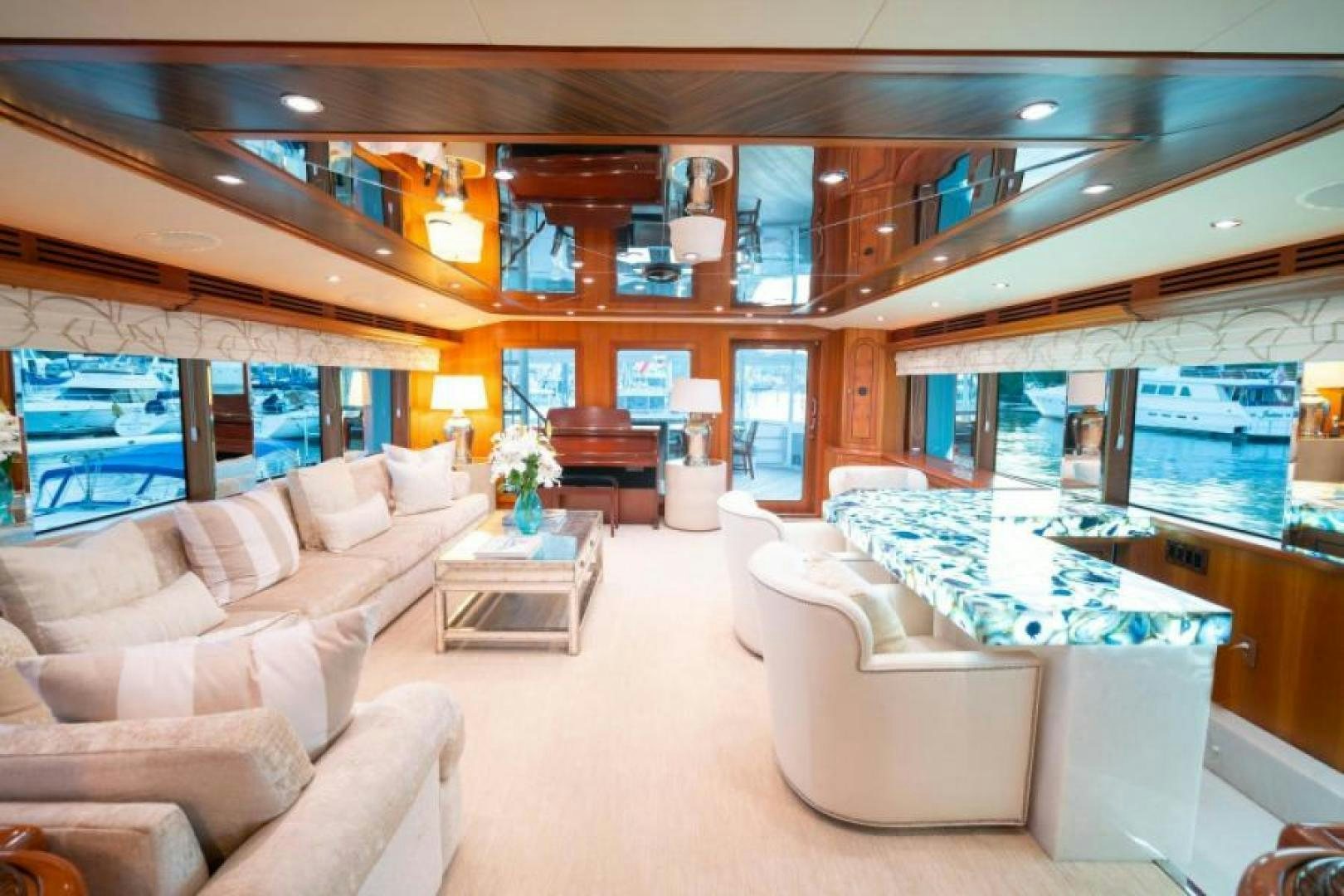 a room with couches and a table aboard DANIELLE Yacht for Sale