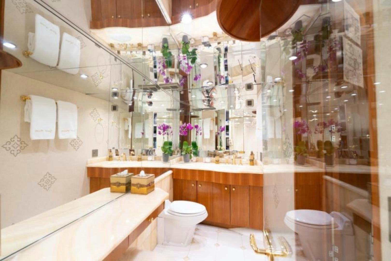 a bathroom with a shower and toilet aboard DANIELLE Yacht for Sale