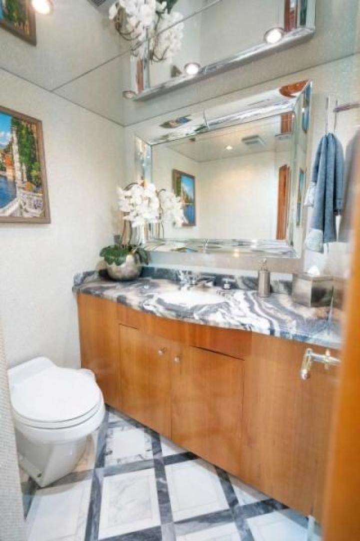 a bathroom with a sink and a toilet aboard DANIELLE Yacht for Sale
