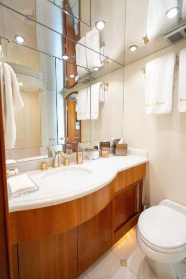 a bathroom with a sink and toilet aboard DANIELLE Yacht for Sale