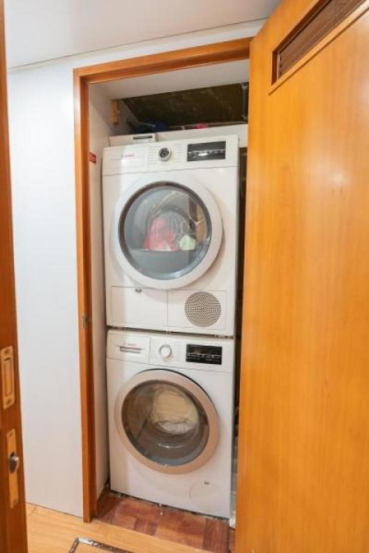 a washer and dryer in a closet aboard DANIELLE Yacht for Sale