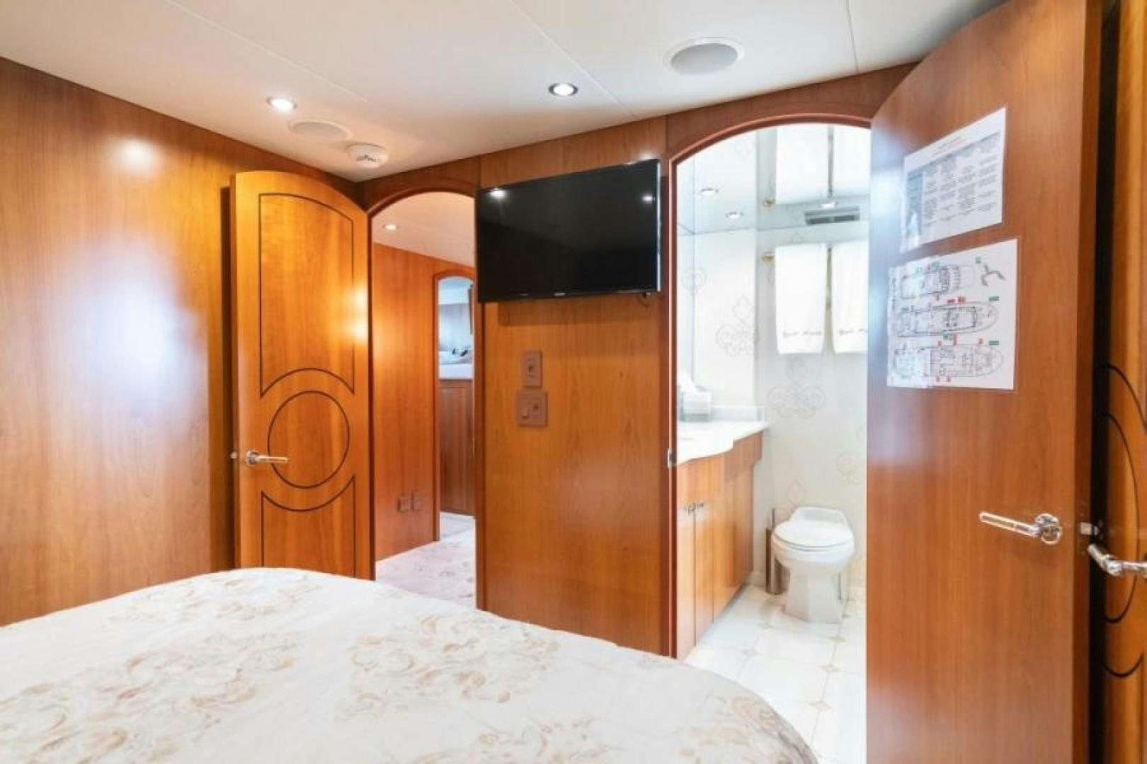 a hotel room with a bed aboard DANIELLE Yacht for Sale