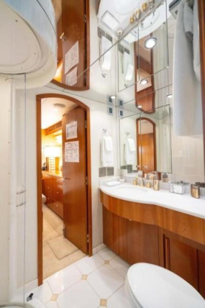 a bathroom with a toilet and sink aboard DANIELLE Yacht for Sale