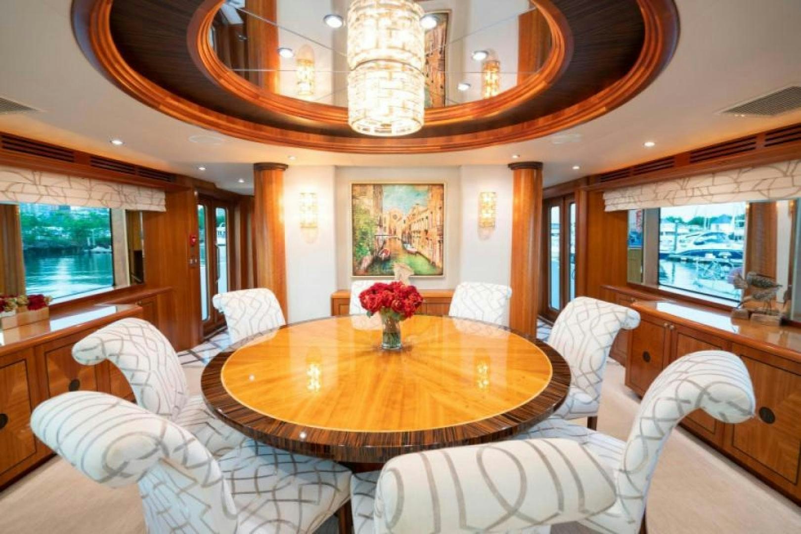 a dining room with a table and chairs aboard DANIELLE Yacht for Sale