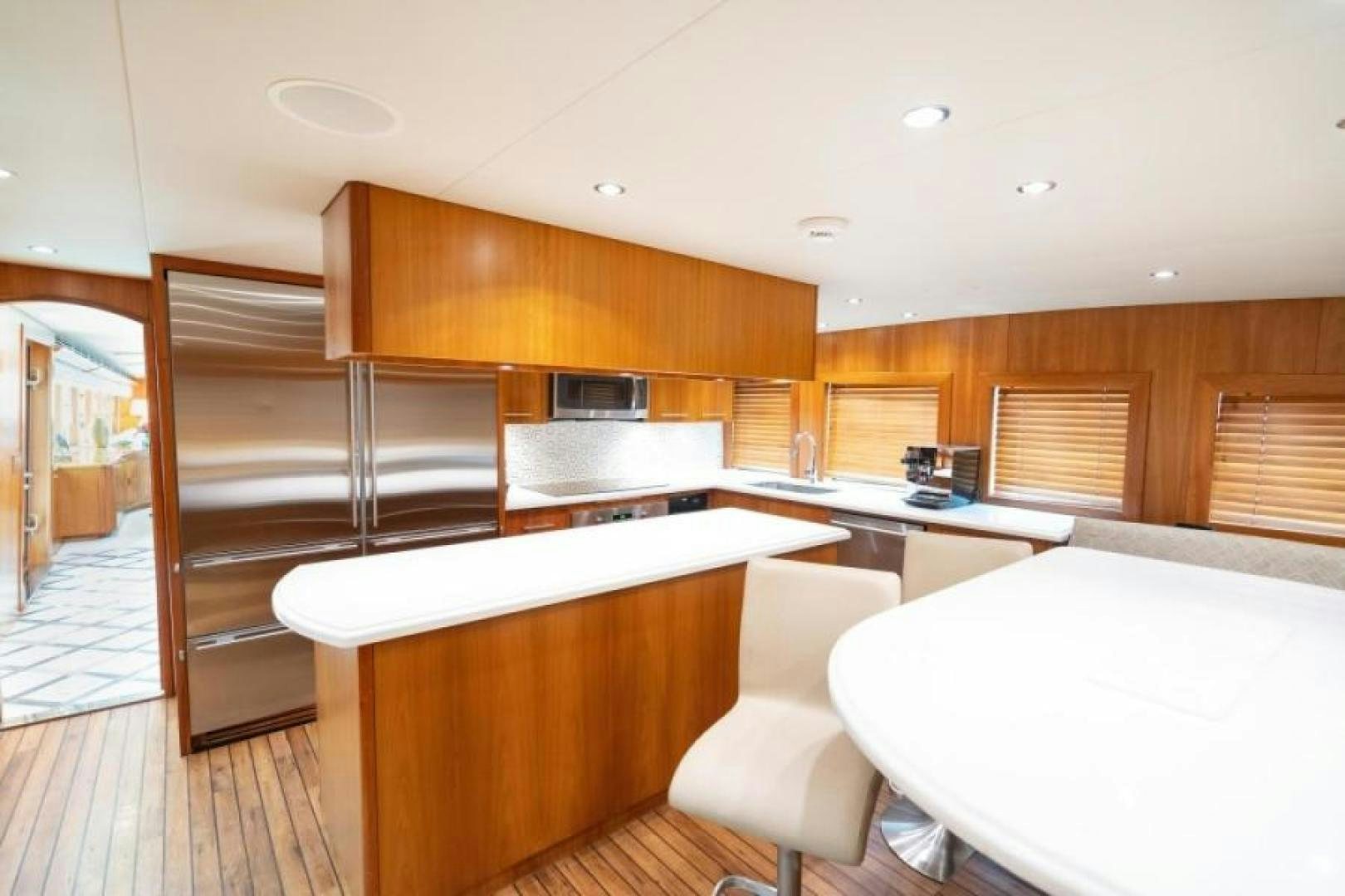 a kitchen with a large island aboard DANIELLE Yacht for Sale