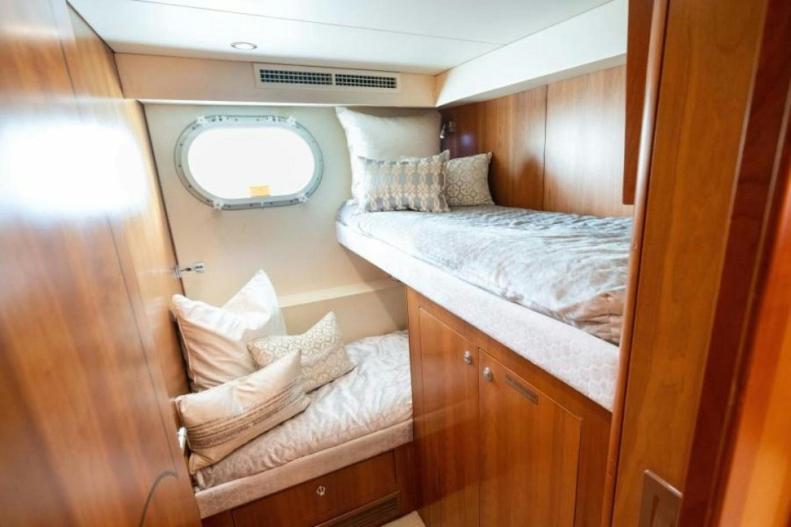 a room with two beds aboard DANIELLE Yacht for Sale