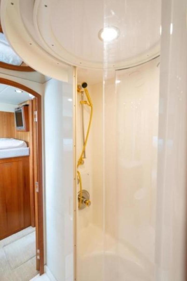 a shower with a shower curtain aboard DANIELLE Yacht for Sale