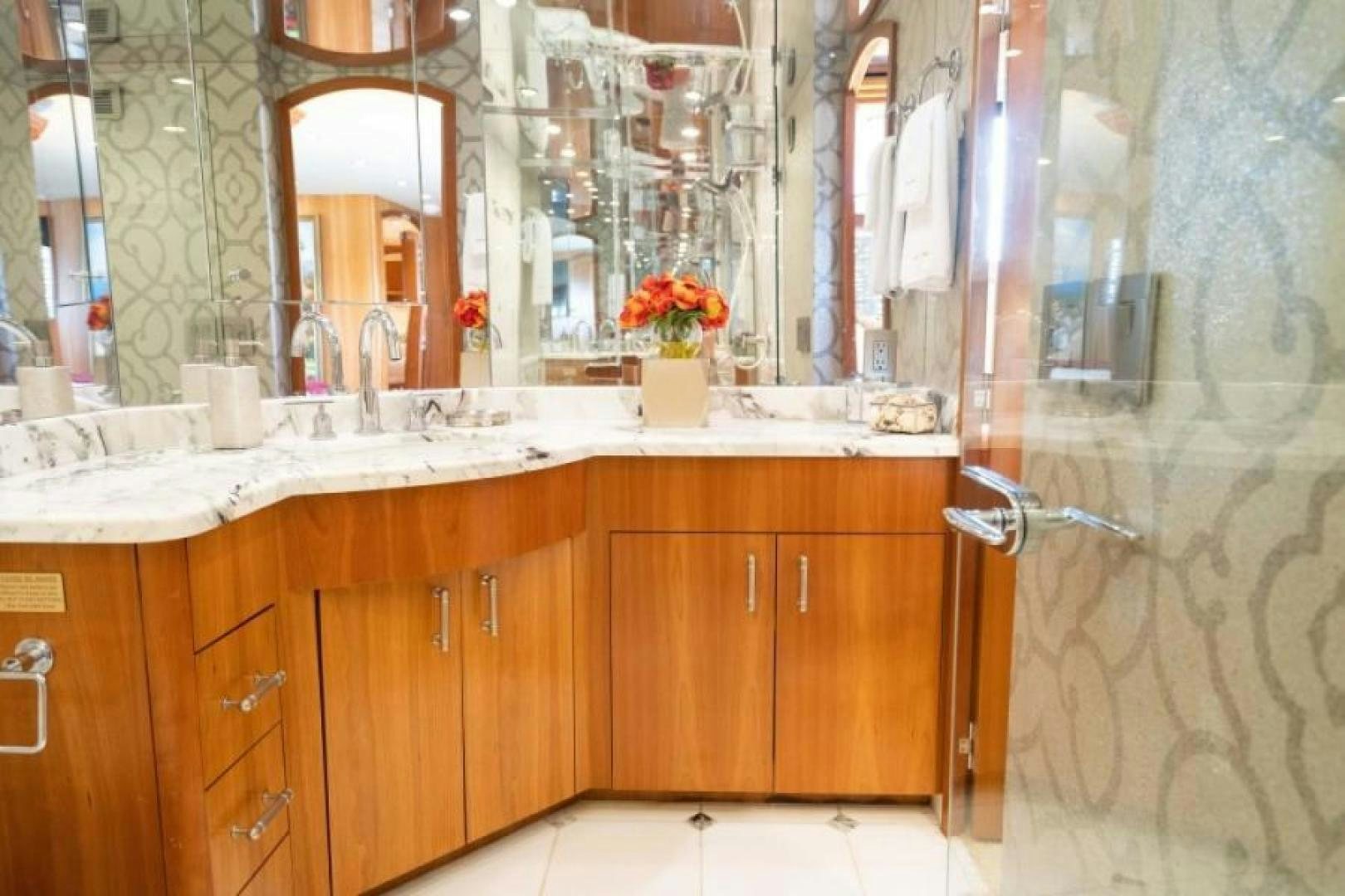 a kitchen with a sink and cabinets aboard DANIELLE Yacht for Sale