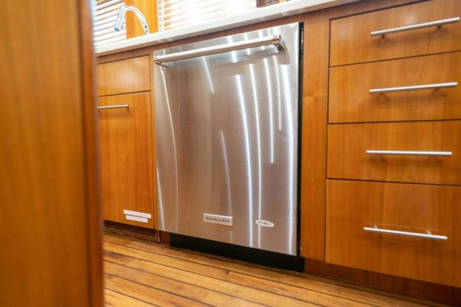 a wooden cabinet with drawers aboard DANIELLE Yacht for Sale