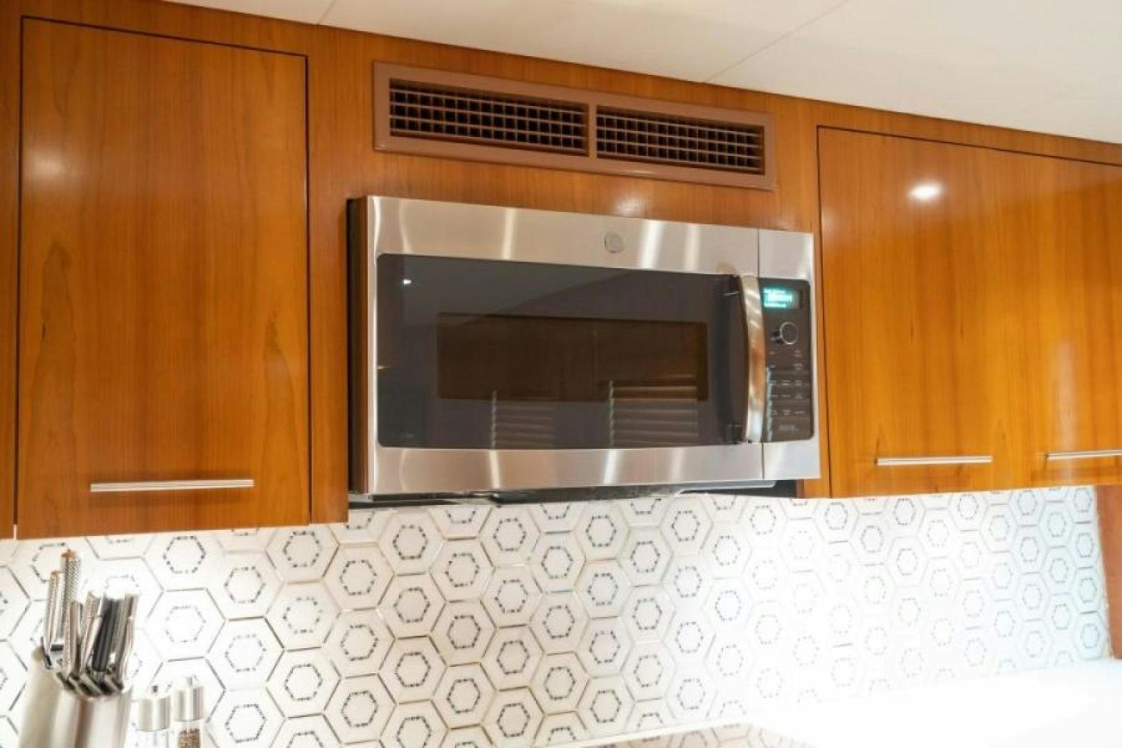 a microwave oven in a kitchen aboard DANIELLE Yacht for Sale