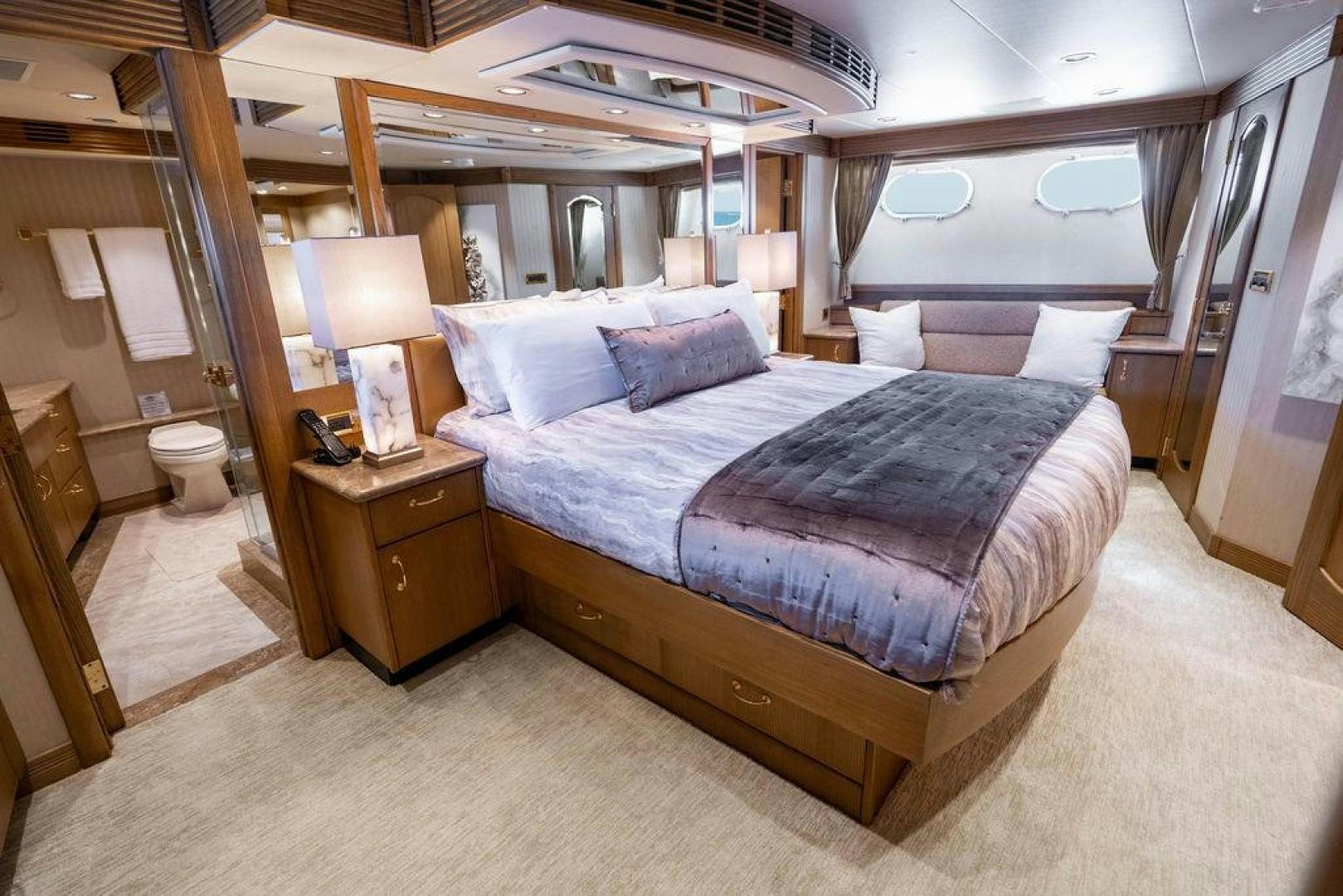 a bed in a room aboard NORTH COAST 120 Yacht for Sale