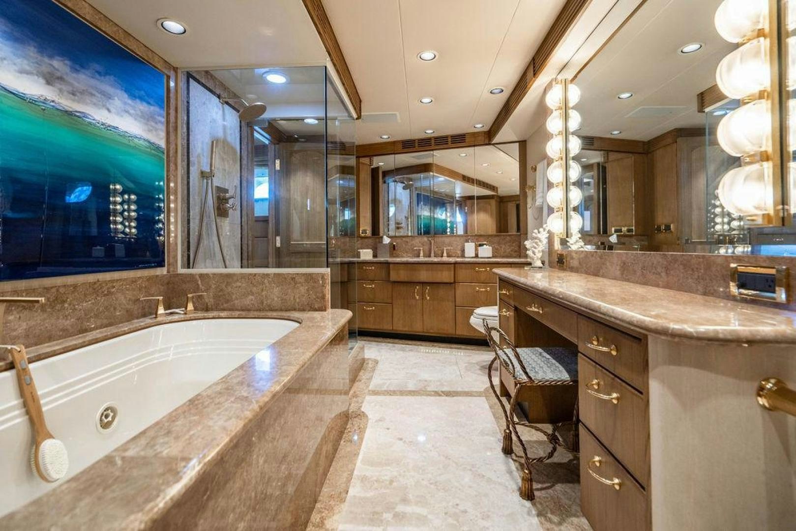 a bathroom with a large bathtub aboard NORTH COAST 120 Yacht for Sale