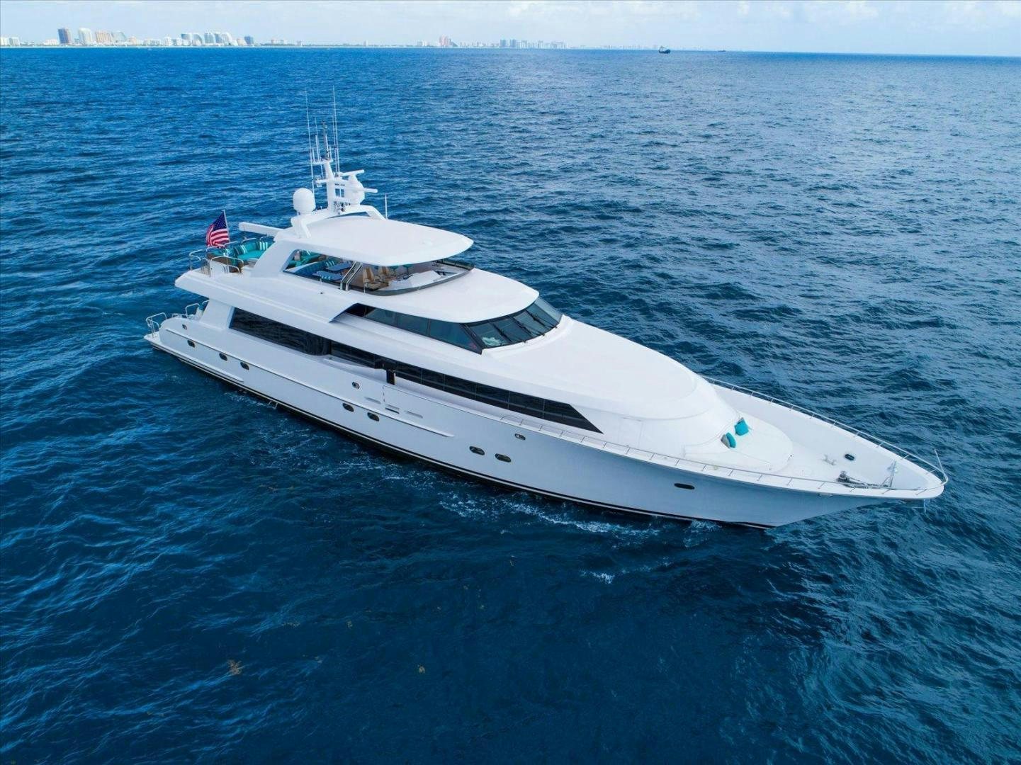 a white yacht in the water aboard NORTH COAST 120 Yacht for Sale
